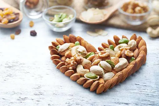 dry fruits placed in heart shape